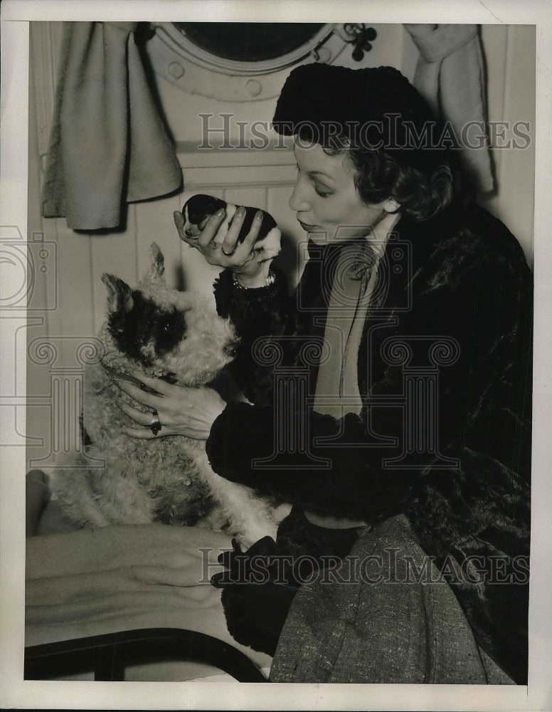 1940 Mrs. Paul Gunzbourg of Belgium with Puppy Born on SS Siboney-Historic Images