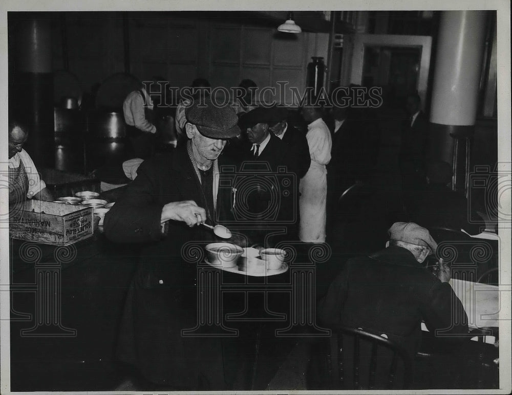 1933 People getting food at breadline  - Historic Images