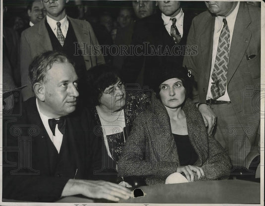 1931 Press Photo People Sitting At Table With Crowd Behind Them - Historic Images
