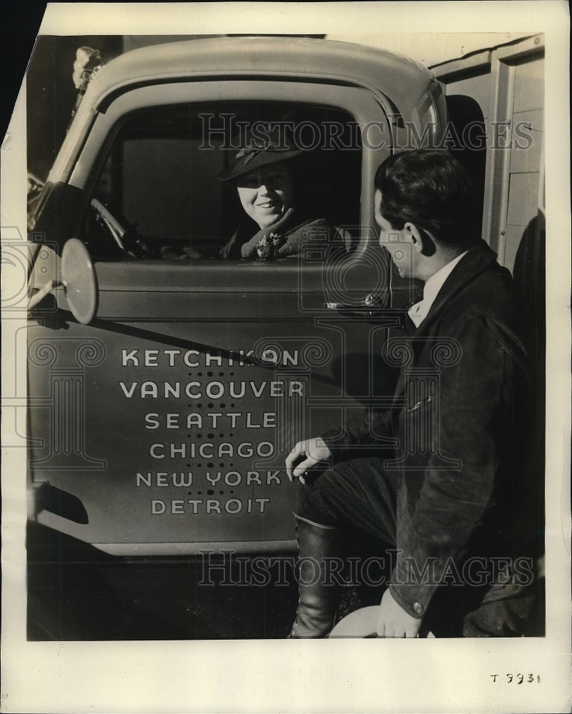 1937 Al Radero, famed safety truck driver, meets Mrs. M. Stepp - Historic Images