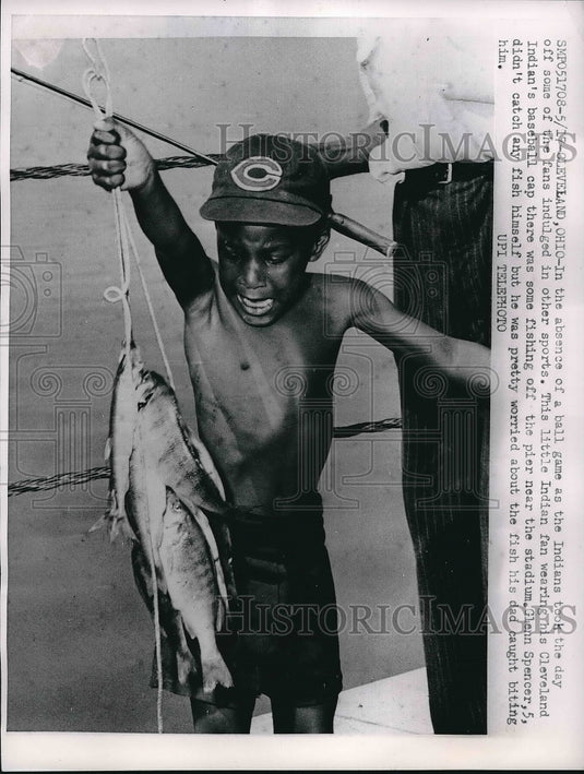 1962 Press Photo Glenn Spencer shows off fish caught by his dad - Historic Images