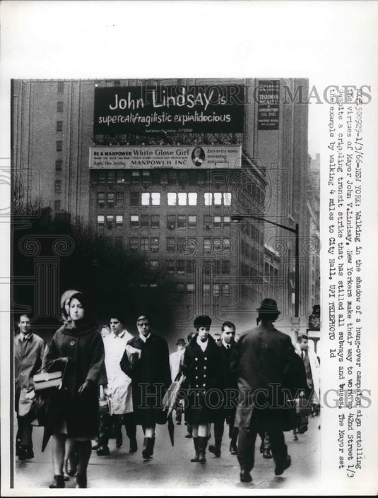 1966 Press Photo New Yorkers Walk Up 42nd Street Under Campaign Sign For Mayor-Historic Images
