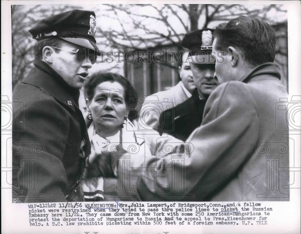 1956 Press Photo Mrs. Julia Lampert Stopped by Police Picketing Russian Embassy-Historic Images