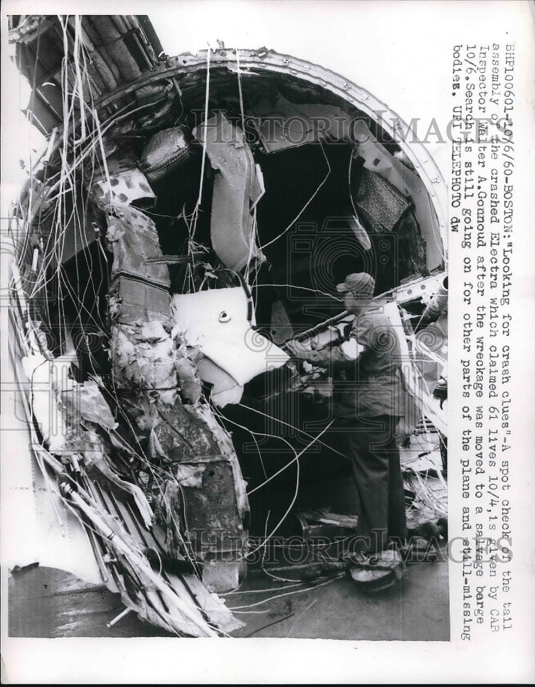 1960 Cab Inspector Walter Gonnound inspecting the wreckage of-Historic Images