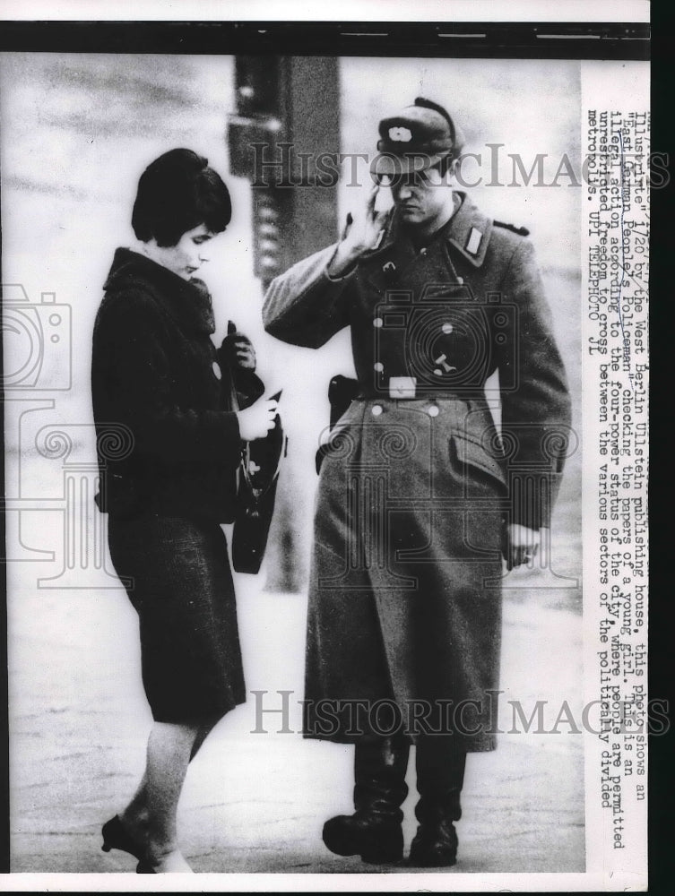 1961 East German People&#39;s Policeman check papers illegally of girl-Historic Images