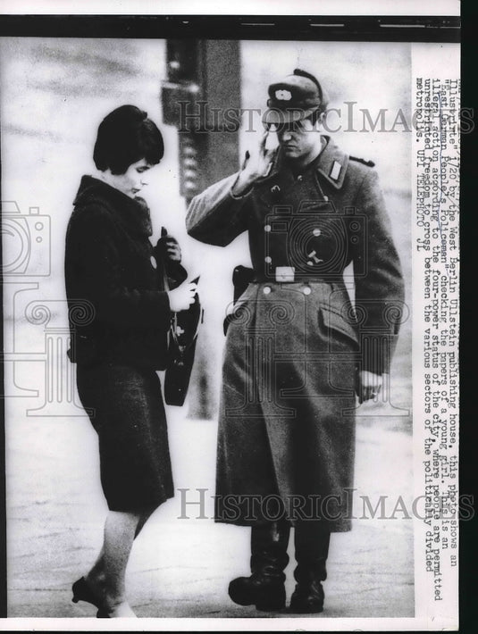 1961 East German People's Policeman check papers illegally of girl-Historic Images