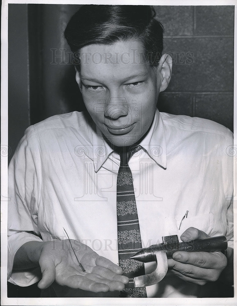 1958 Engineer jack Hedge Holds Vortex Thermometer Used in a Aircraft - Historic Images