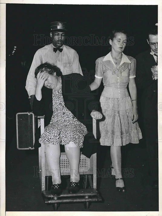 1943 Mrs Sara Larkin in the wheelchair with her daughter Mrs. Neary. - Historic Images