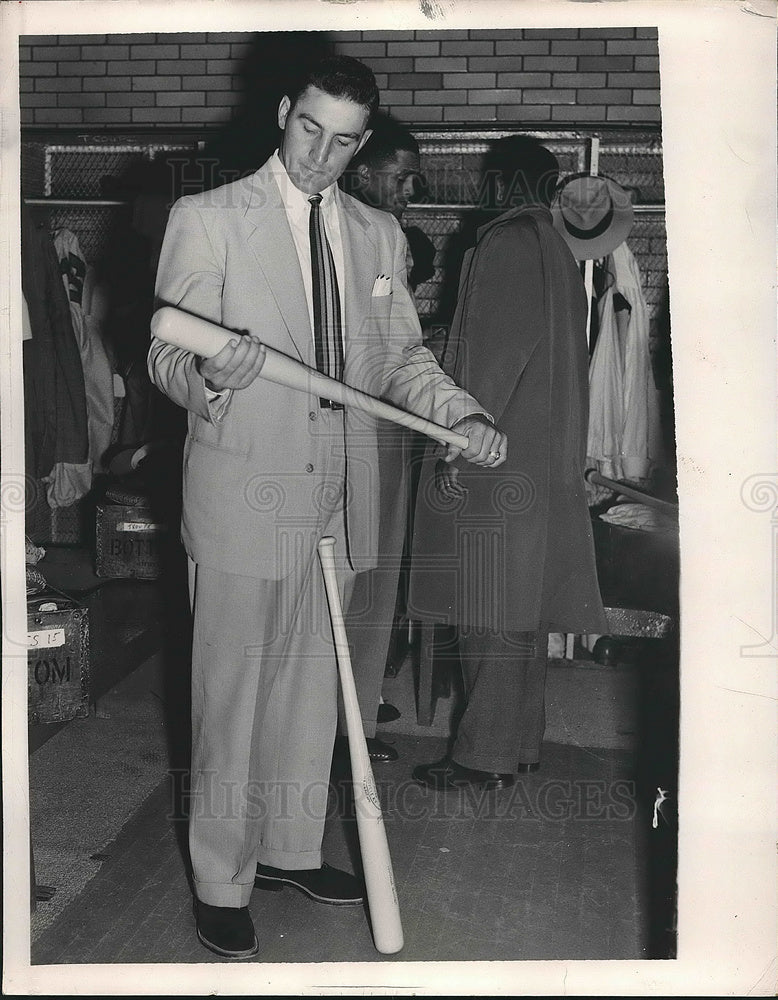 1952 Baseball player Jim Fridberg in the locker room - Historic Images