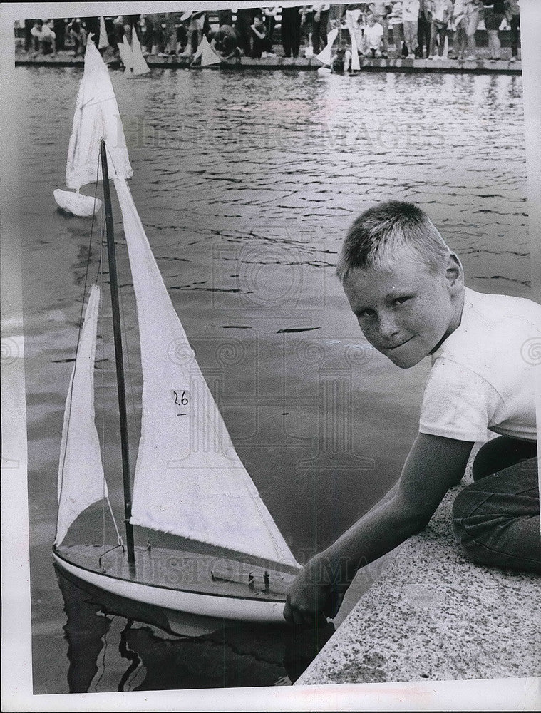 1964 Press Photo Tim Nageotte Playing With Sail Boat In Water - neb12714 - Historic Images