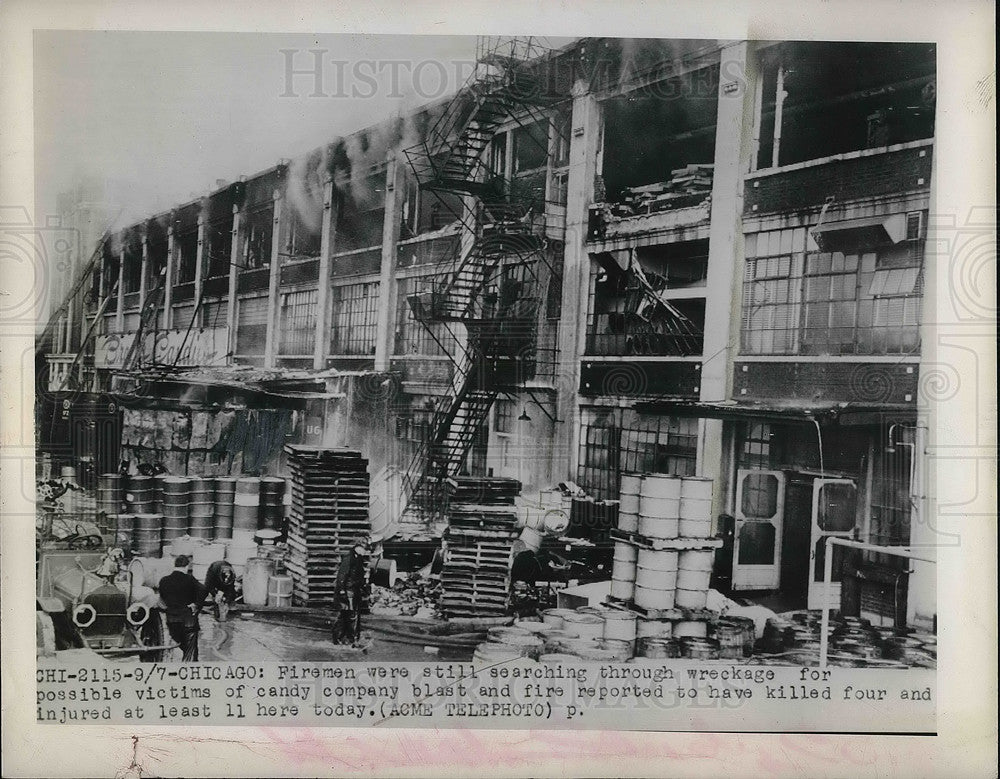 1948 Press Photo Chicago, firemen search candy company after explosion - Historic Images