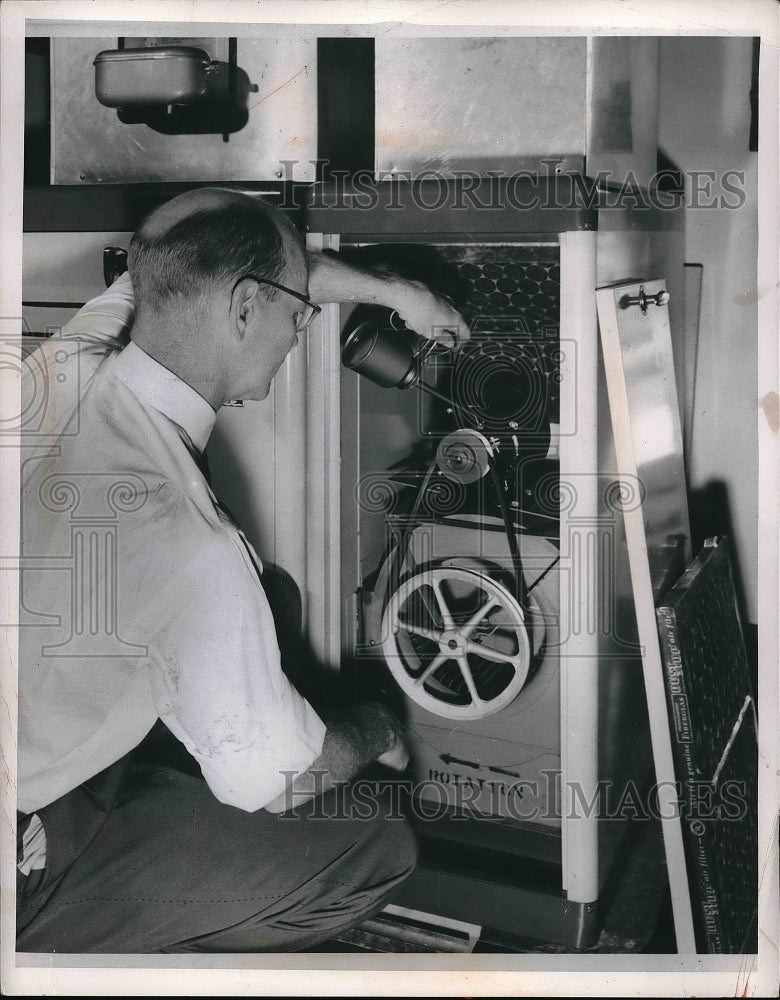 1955 Press Photo Man Oiling Furnace Blower - neb15697 - Historic Images