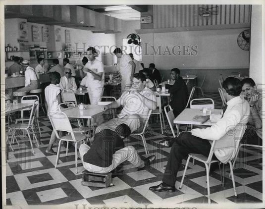 1963 Press Photo Men Gather and Talk at Local Cafe Discussing Events- Historic Images