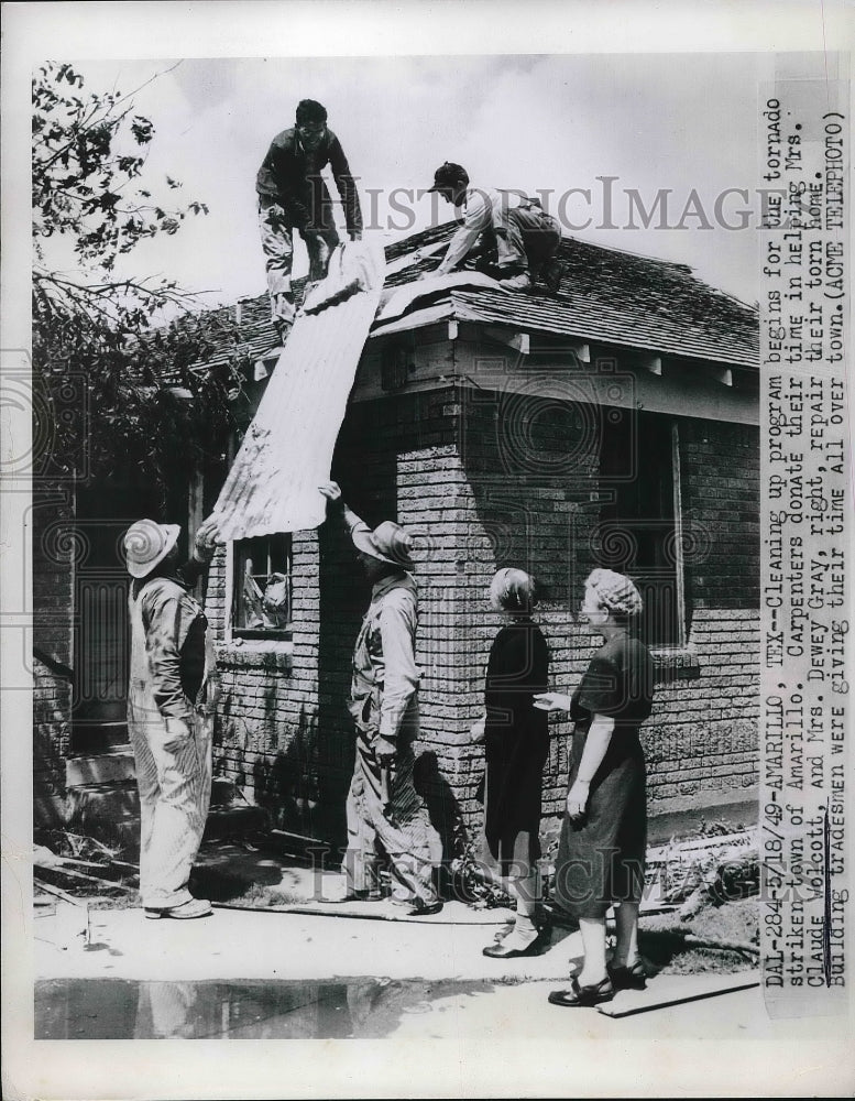 1949 Amarillo, Tx Mrs Walcott & crew clean up her home after tornado - Historic Images