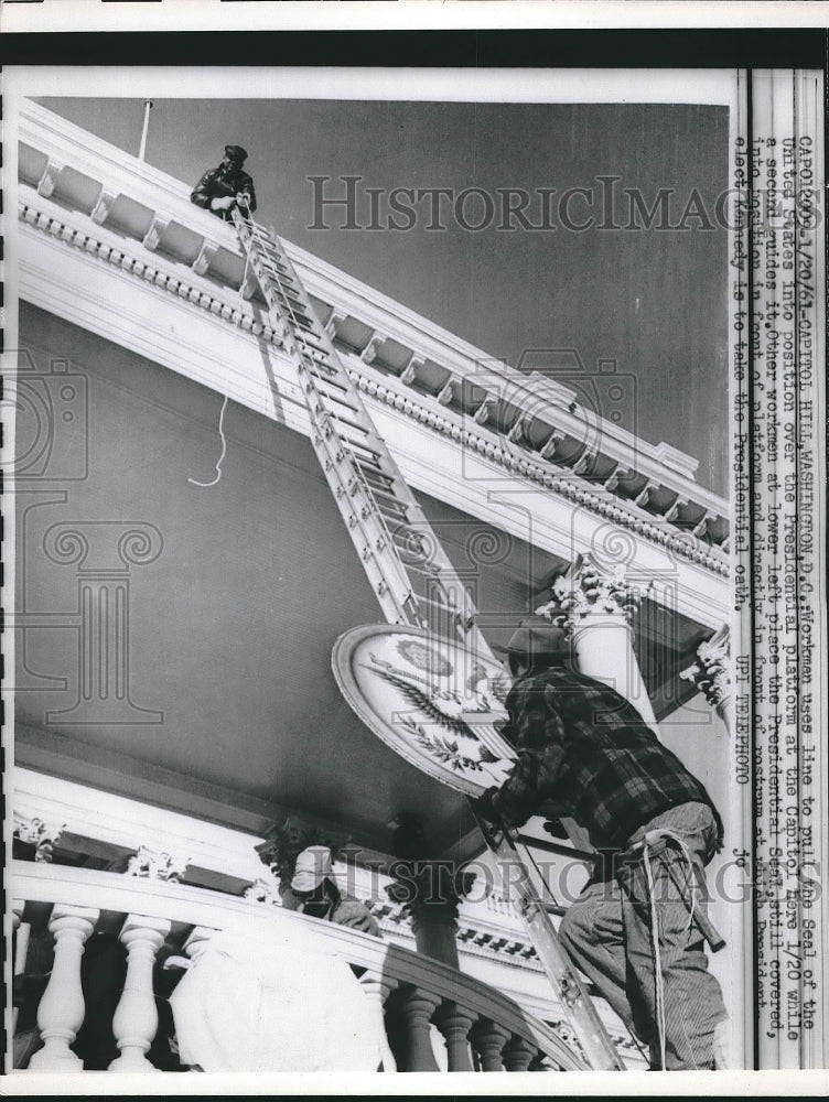 1961 Press Photo Workmen Placing Presidential Seal at Capitol - neb18288 - Historic Images