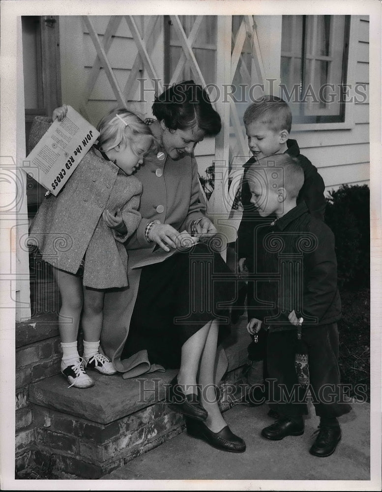 1957 Press Photo Red Cross Mrs. Robert R. Augsburger, Davis &amp; John - neb19908 - Historic Images