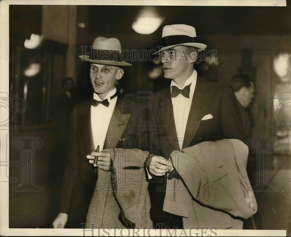 1931 Press Photo J.H Robillard, and Edwin Mead leaving a hotel.-Historic Images