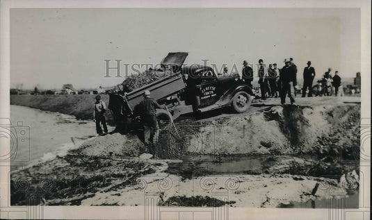 1939 Glasglow, Mont Milk river levee being repaired from floods - Historic Images