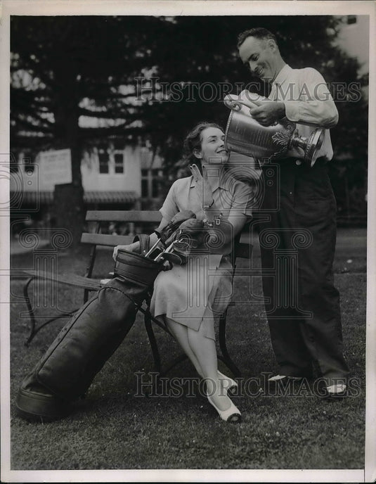 1938 Press Photo Denny Shute, Golf Champ, Give Wife Drink From Championship Cup - Historic Images