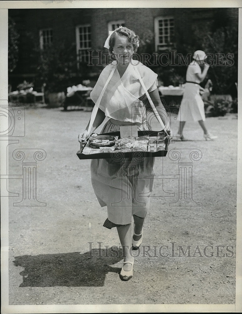1933 Miss Barbara Babcock selling candy and cigarettes at the 2nd-Historic Images