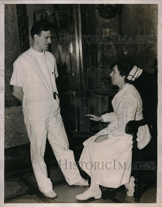 1938 Press Photo Dr. Francis Pigliolino & Nurse Agnes Howard talking about their-Historic Images