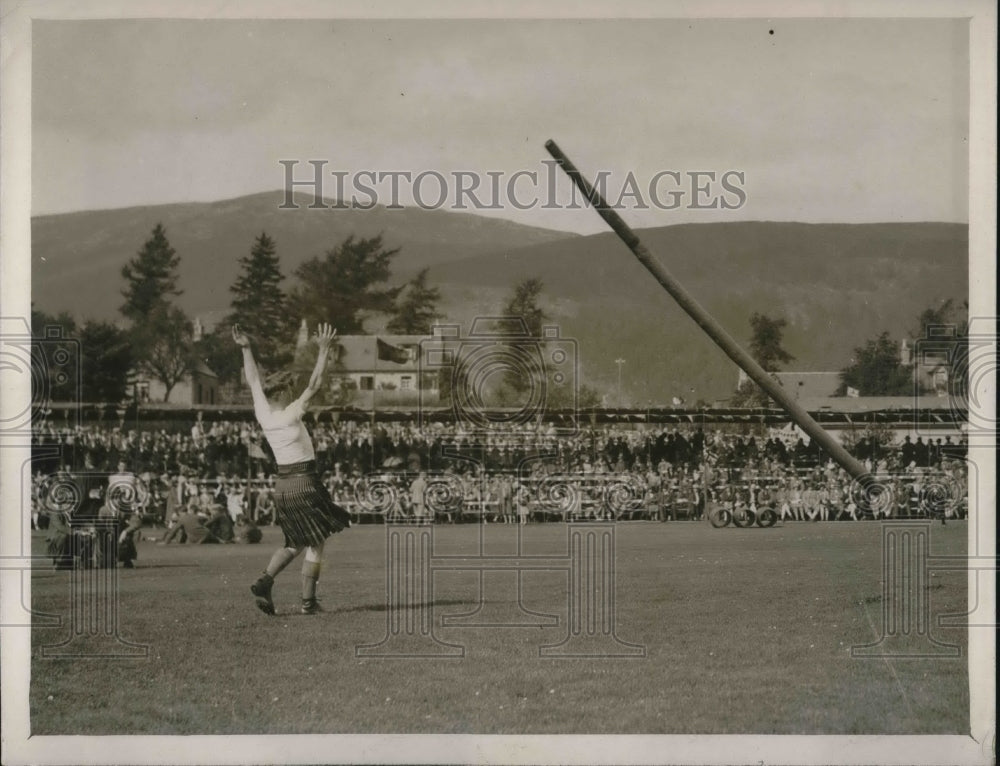 1928 &quot;Tossing the Caber&quot; at Braemar Gathering in Scotland - Historic Images