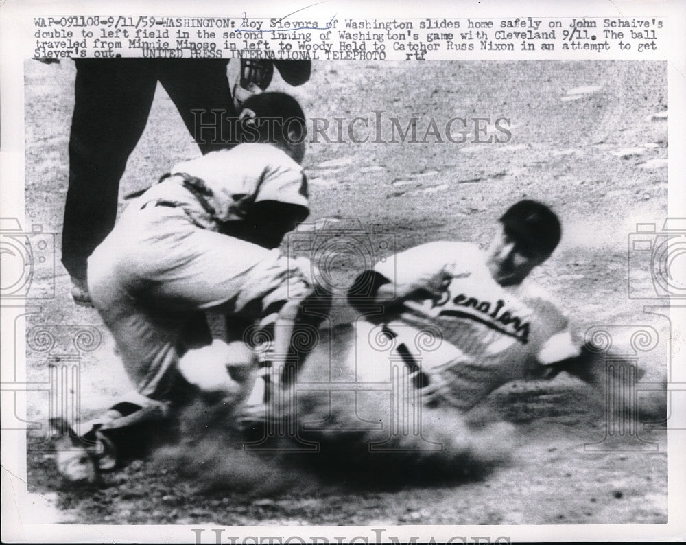 1959 Press Photo Roy Sievers slides home safely - Historic Images