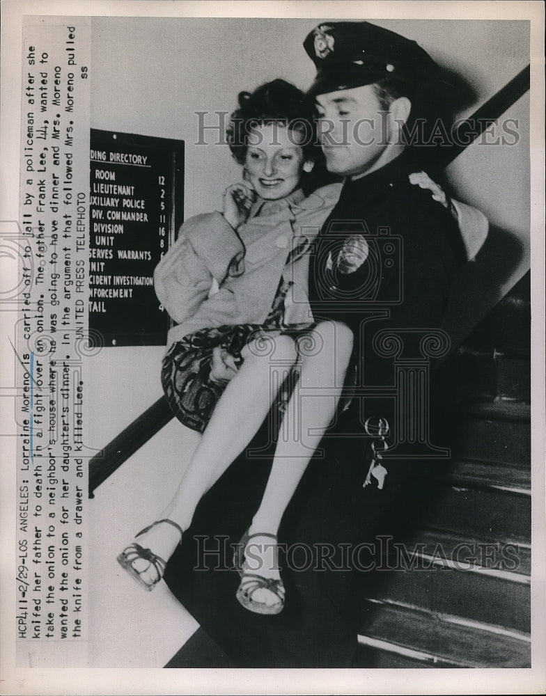 1955 Press Photo Lorraine Moreno carry by police after she knifed her father. - Historic Images