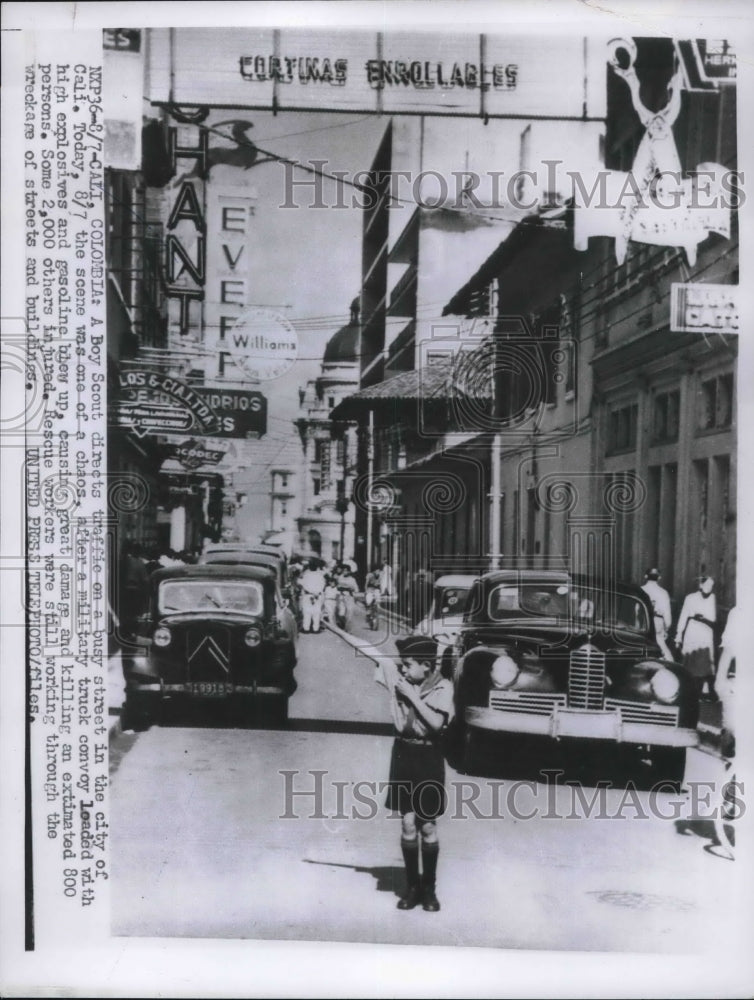 1956 Press Photo Boy Scout Directs Traffic After Military Convoy Blew Up - Historic Images