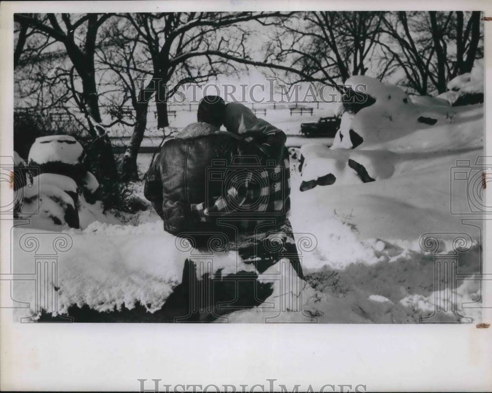 1949 Couple Sitting in Snow at Gordon Park in Cleveland, Ohio - Historic Images