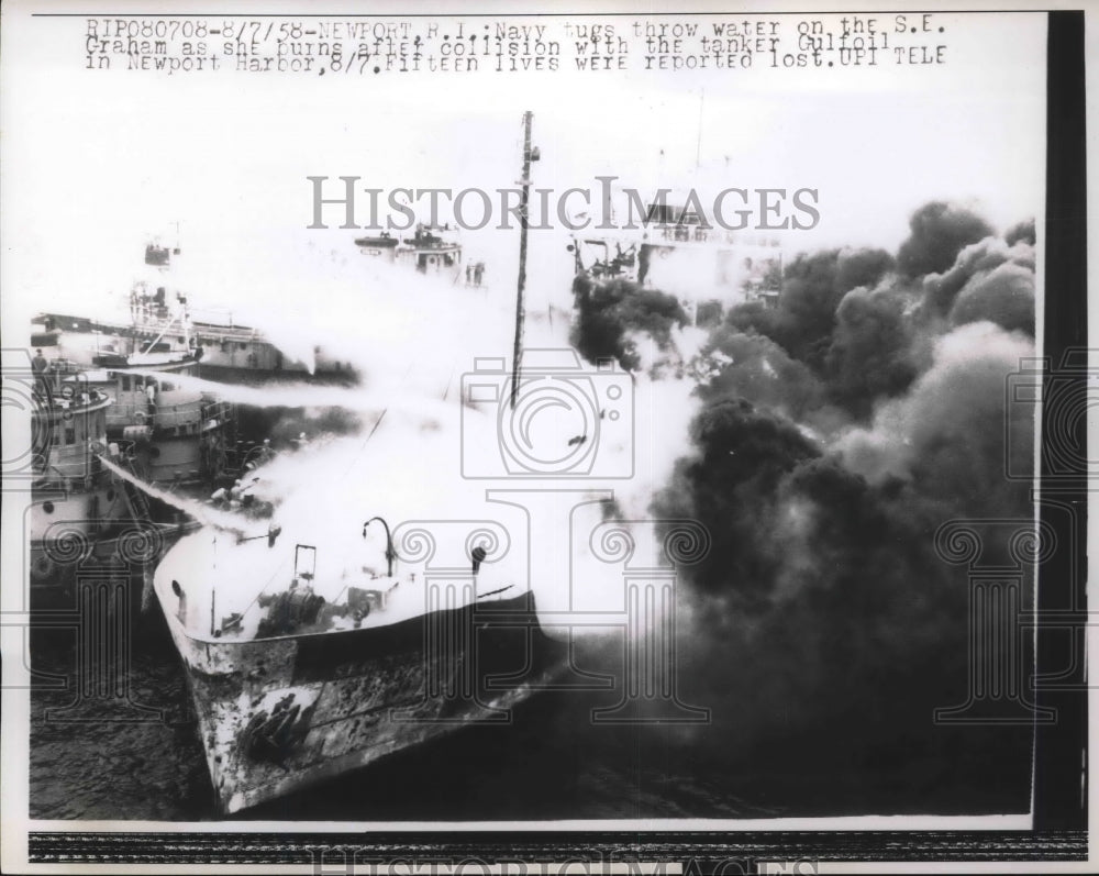 1958 Press Photo Navy Tugs Throw Water on S.E. Graham After Crash with Gulfoil-Historic Images