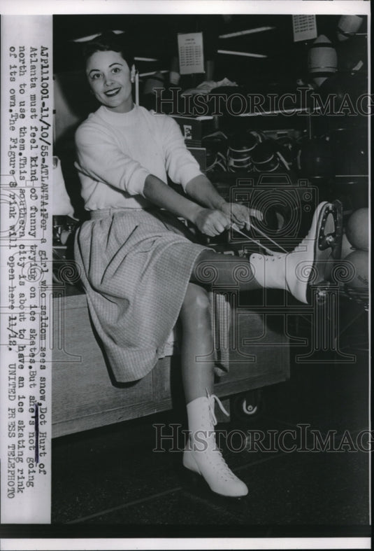 1955 Dot Hurt of Atlanta trying on ice skates-Historic Images