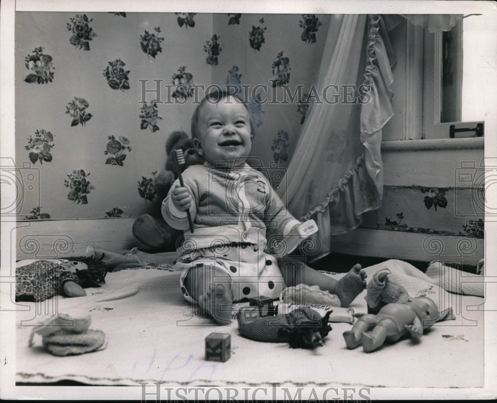 Two your old baby with toothbrush - Historic Images