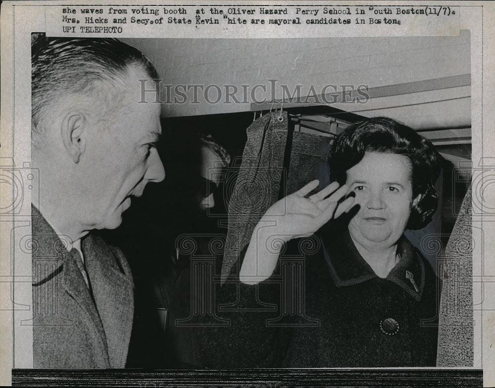 1967 Mrs. Hicks and Secy of State Kevin White waves after voting - Historic Images