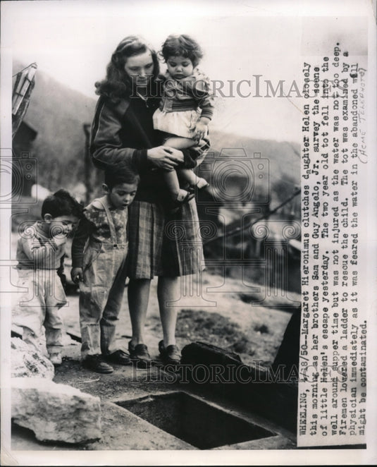 1950 Press Photo Margaret Hieronimus & daughter Helen Fell in This Well & Rescue - Historic Images