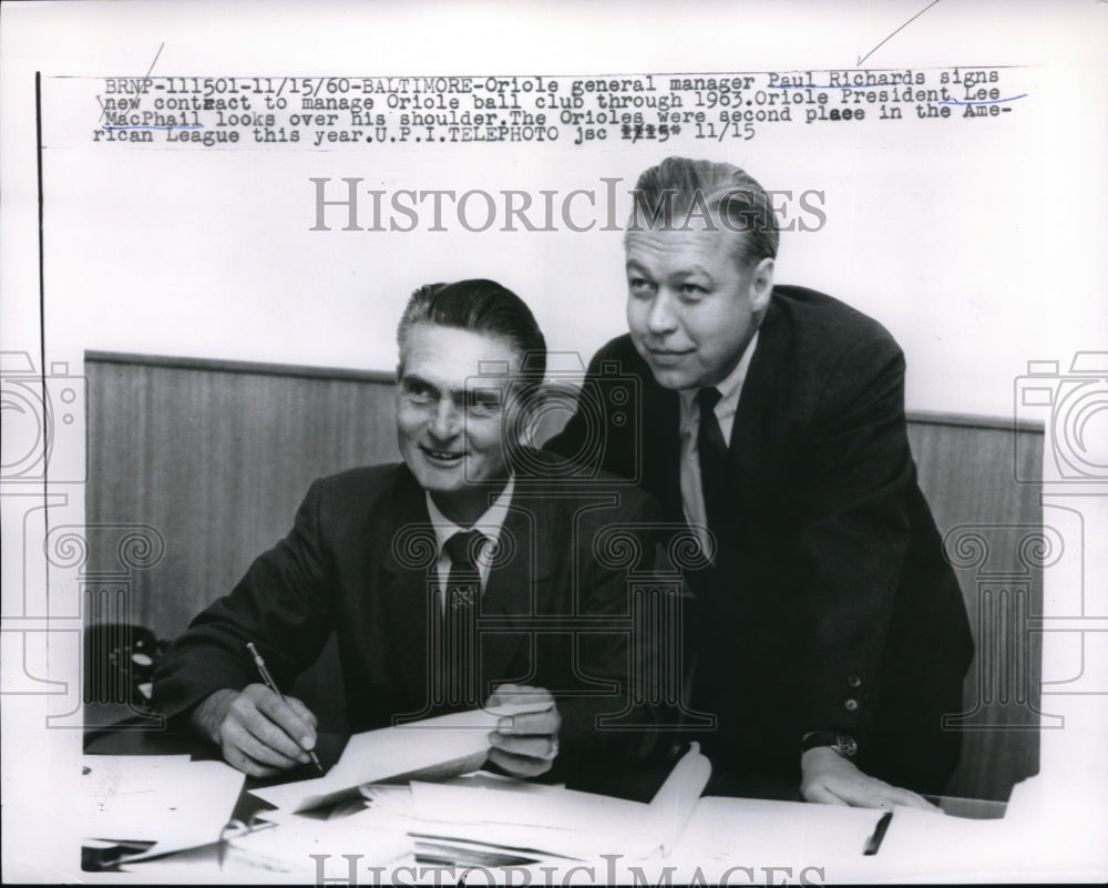 1960 Oriole GM Paul Richards signs new contract through 1963 - Historic Images