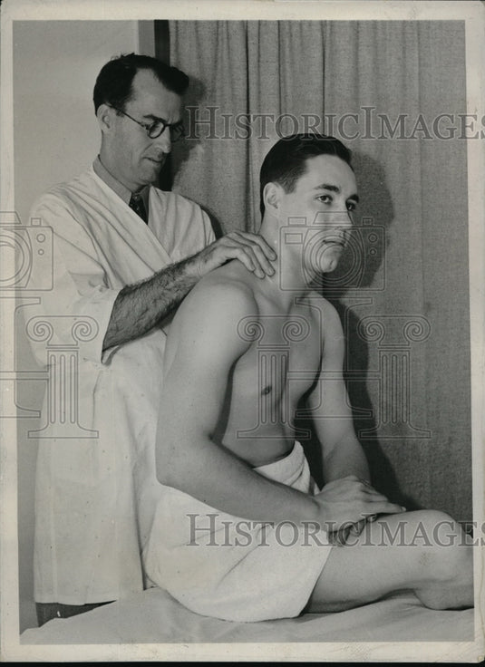 1938 Ken Holloway works on Bob Feller at Holloway's Health Studio.-Historic Images