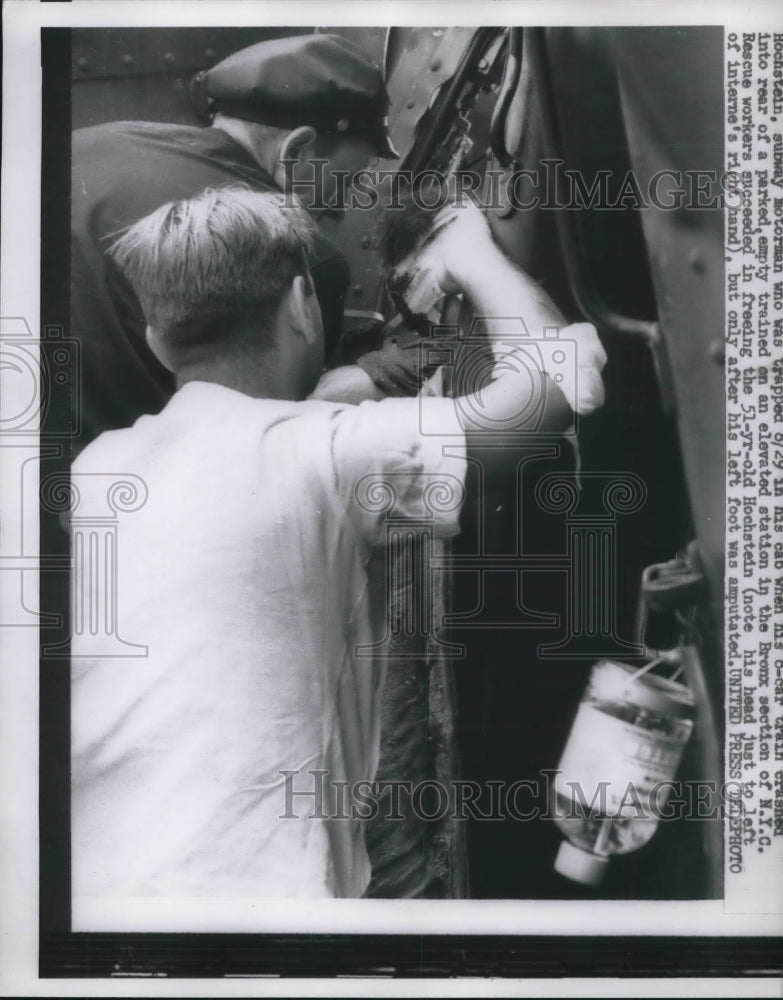 1957 William Hochstein rescued from NYC subway train accident - Historic Images