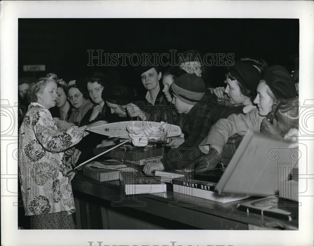 1942 Mrs.C.F. Taylor at Toy Counter - Historic Images