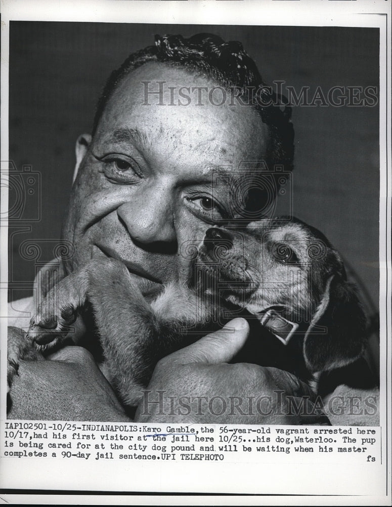 1961 Press Photo Karo Gamble freed from Indianapolis, Ind jail holds his dog - Historic Images