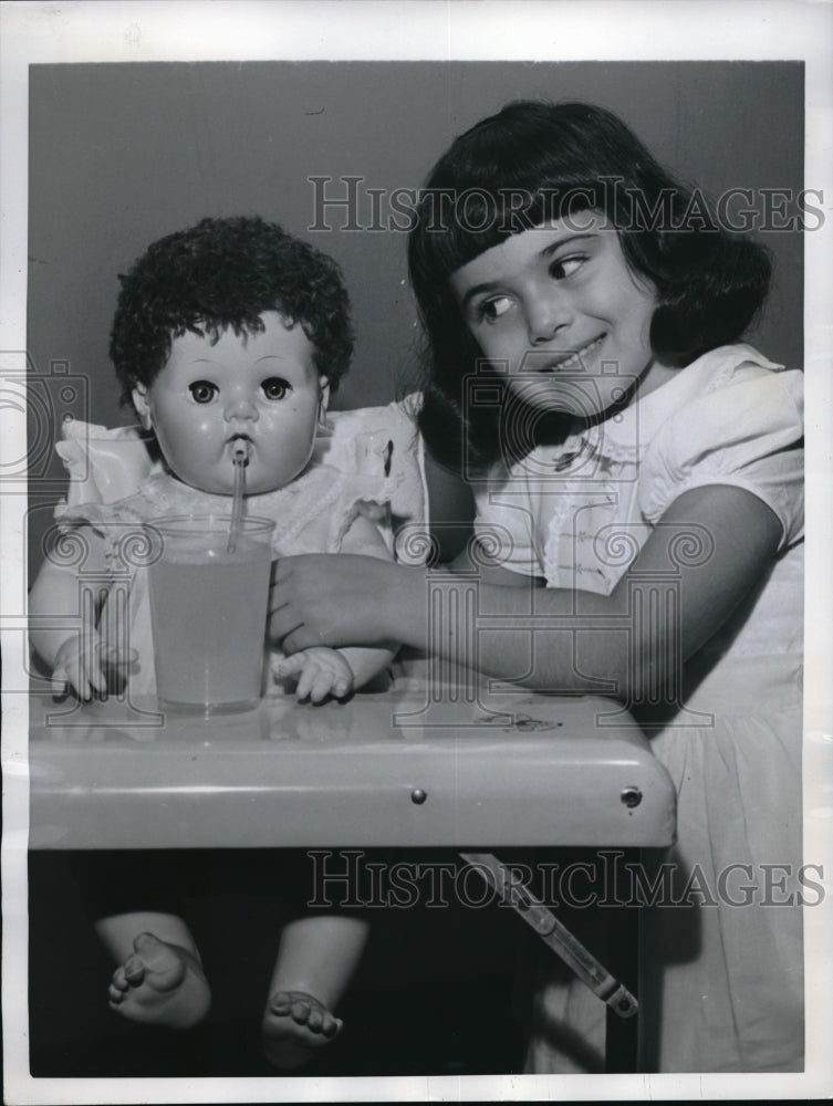 1950 Press Photo Maureen Salese Watches Over Her New Drinking Doll - neb46889 - Historic Images