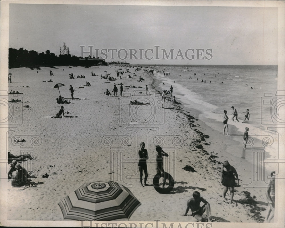 1937 People enjoy the beaches at Miami Beach, Florida-Historic Images