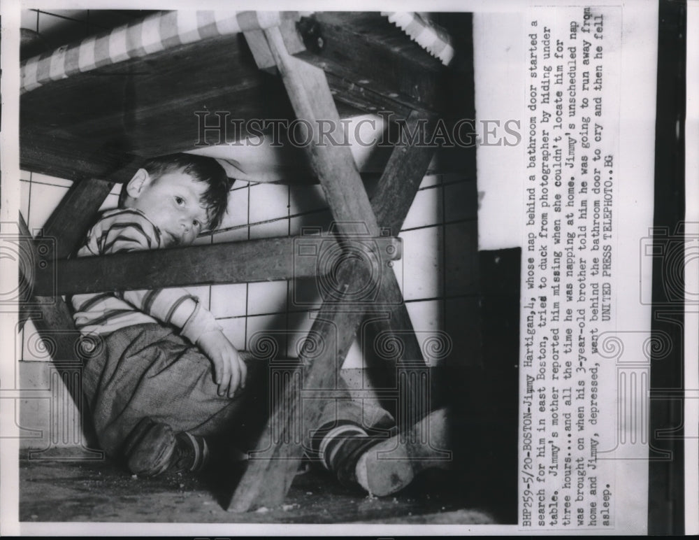 1952 Press Photo Boston, Mass.Jimmy Hartigan, age 4 hiding &amp; thought missing - Historic Images