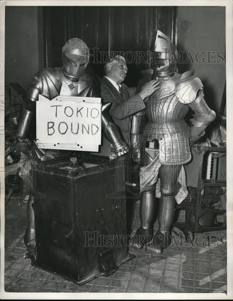 1942 Hotel Manager Louis Fuchs with Armored suits - Historic Images