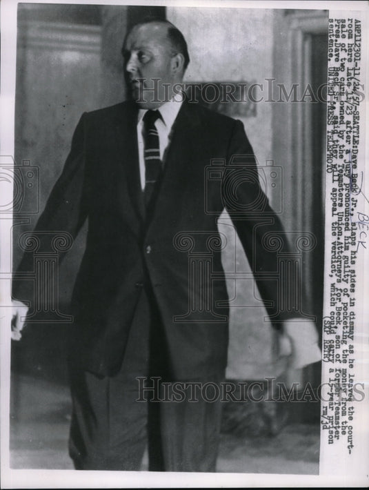 1957 Dave Beck Jr. leaving court - Historic Images