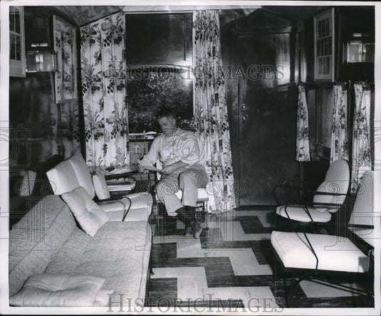 1956 Mr MacKenzie in his RR car office reception room  - Historic Images