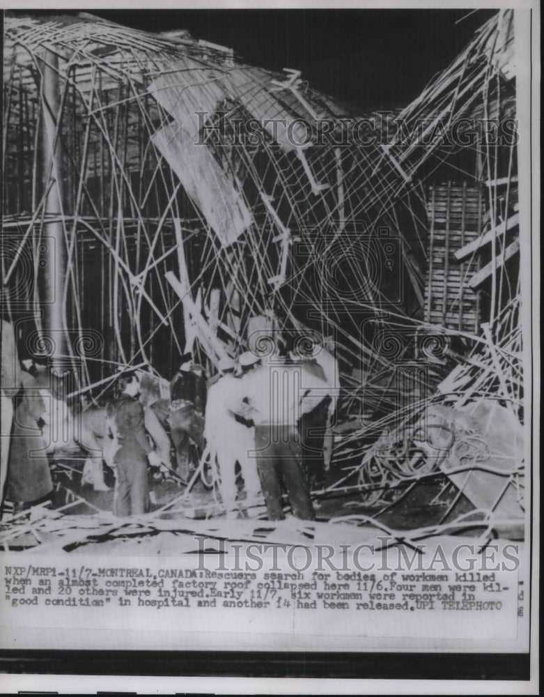 1960 Press Photo Montreal, Canada rescuers search for victims of explosion-Historic Images