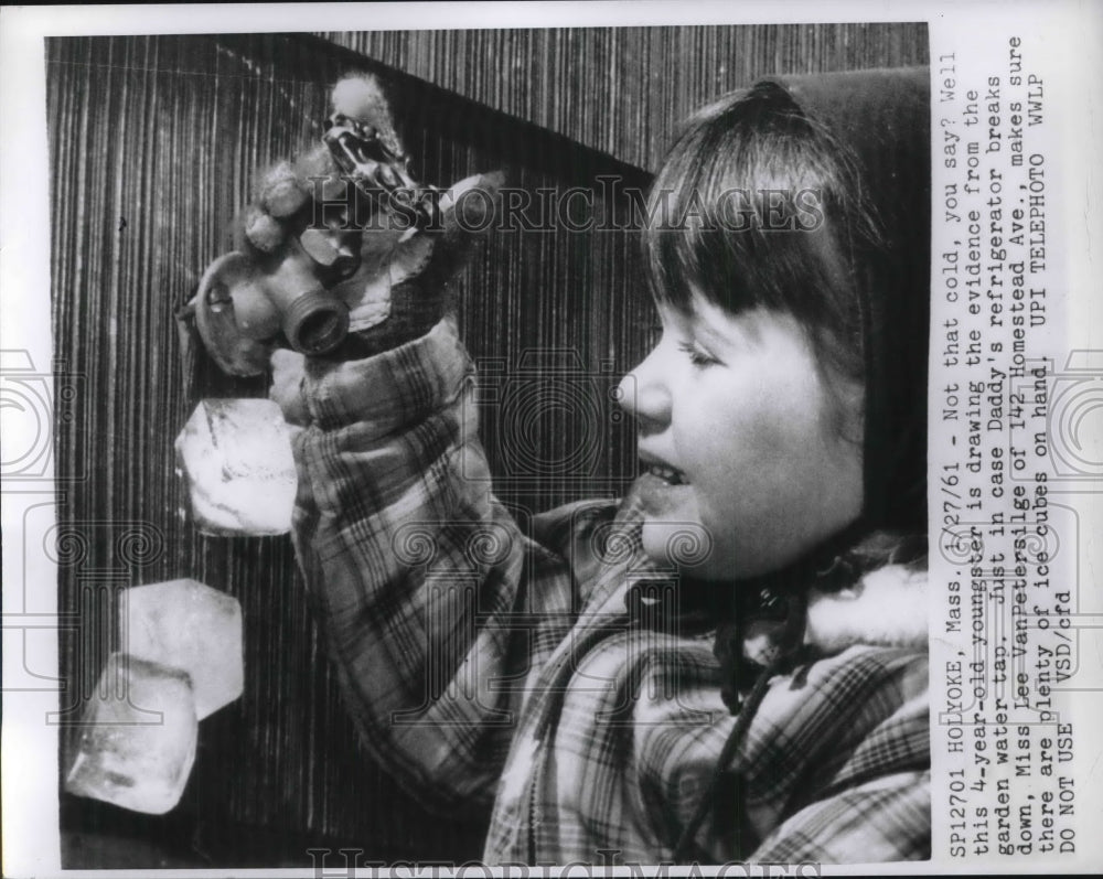 1961 Young Lee VanPetersilge Checks Garden Water Tap in Holyoke, MA - Historic Images