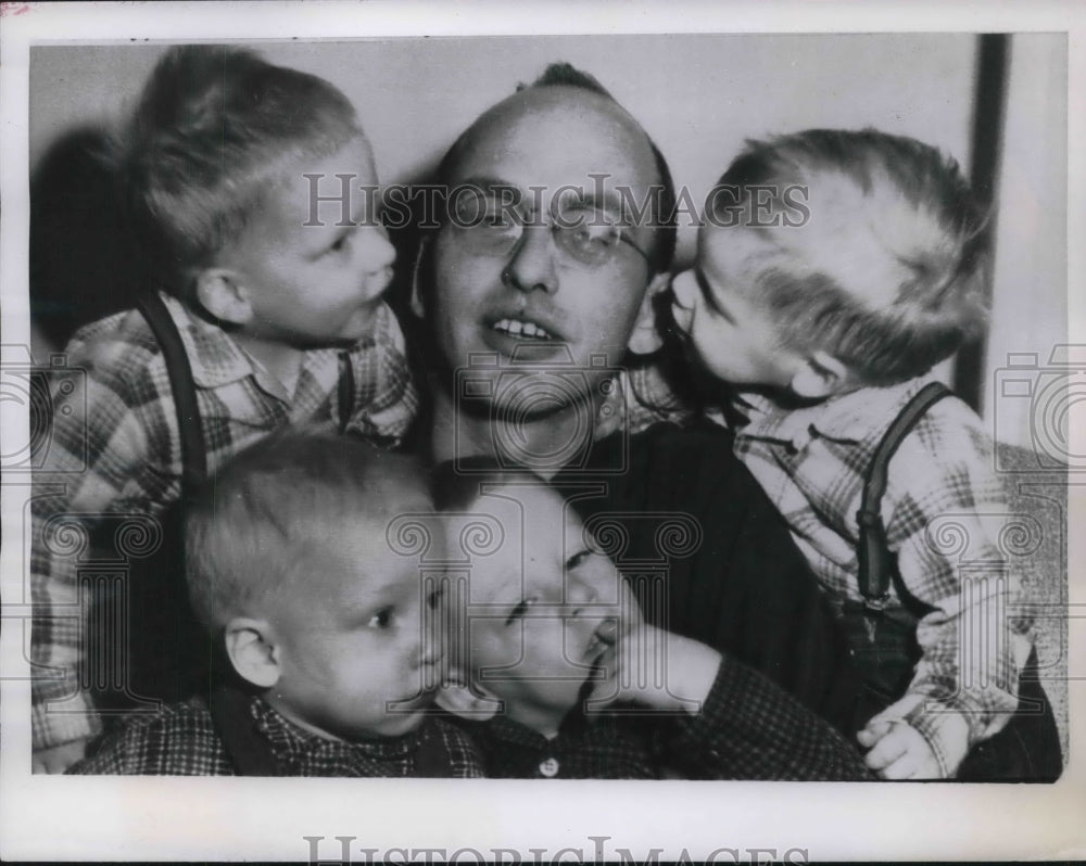 1957 Ray Miller after his wife gave birth to 3rd set of twins - Historic Images