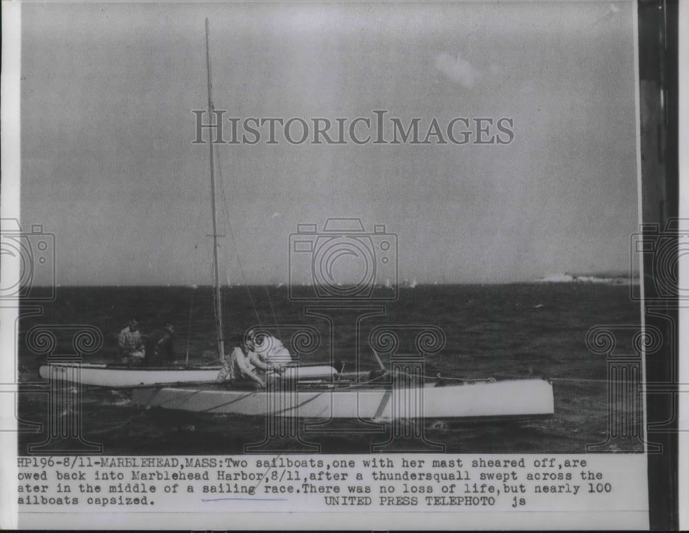 1954 Press Photo Two Sailboats Towed Back To Port After Overcome-Historic Images